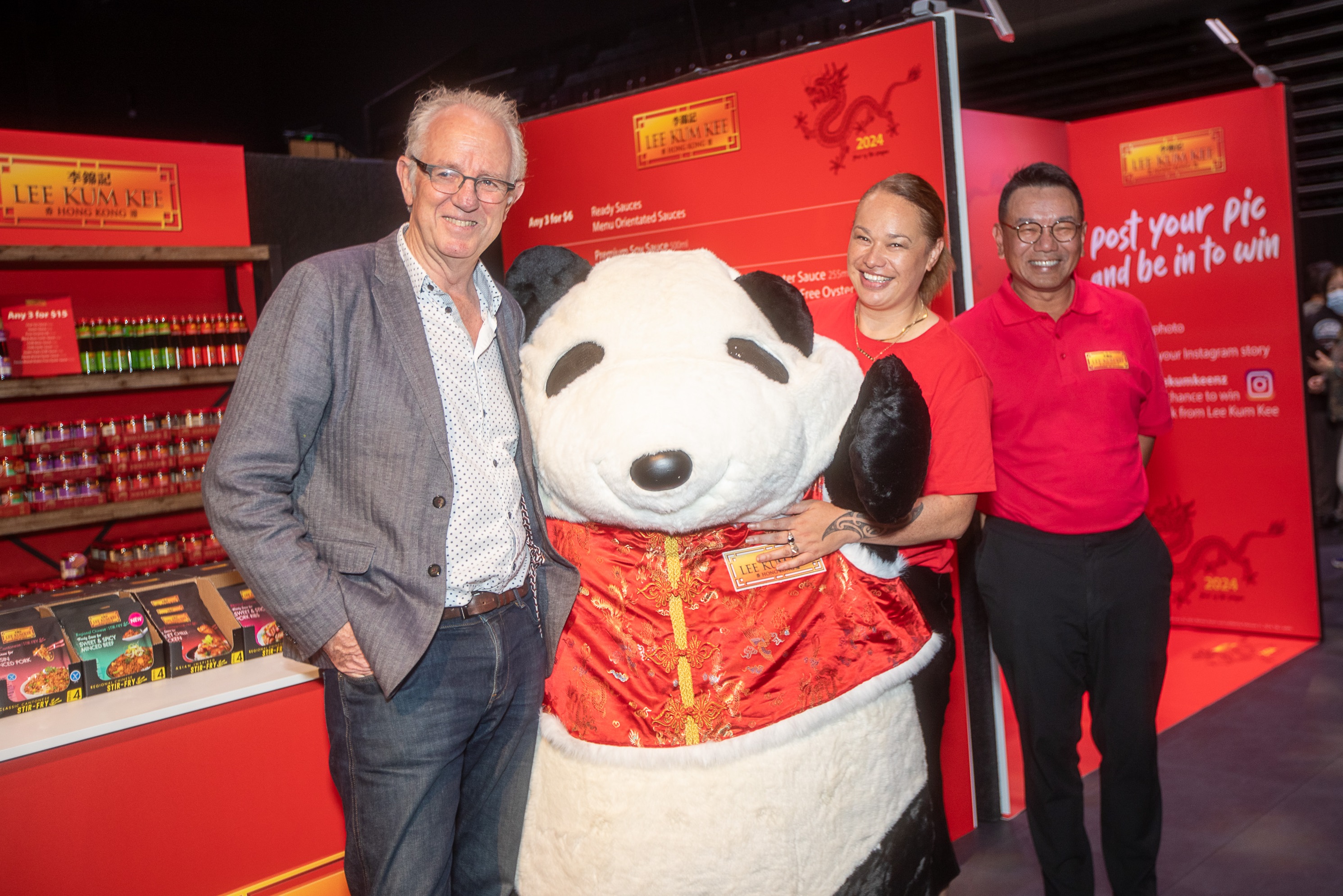 Greg O’Connor, Member of Parliament for Ōhāriu, Tory Whanau, Mayor of Wellington and Dodie Hung, Executive Vice President – Corporate Affairs of Lee Kum Kee picture at Lee Kum Kee booth.