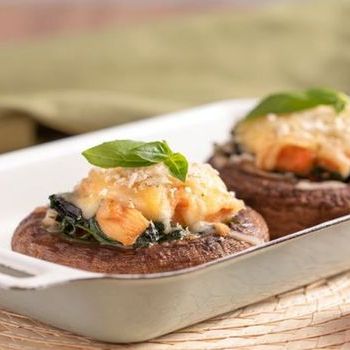Baked Portobello mushroom with tomato cheese spinach and chicken